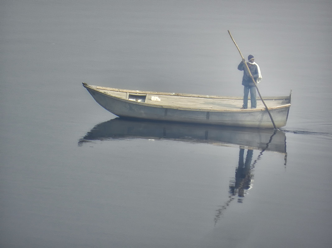 Man in Boat on Yamuna River, Agra, India
